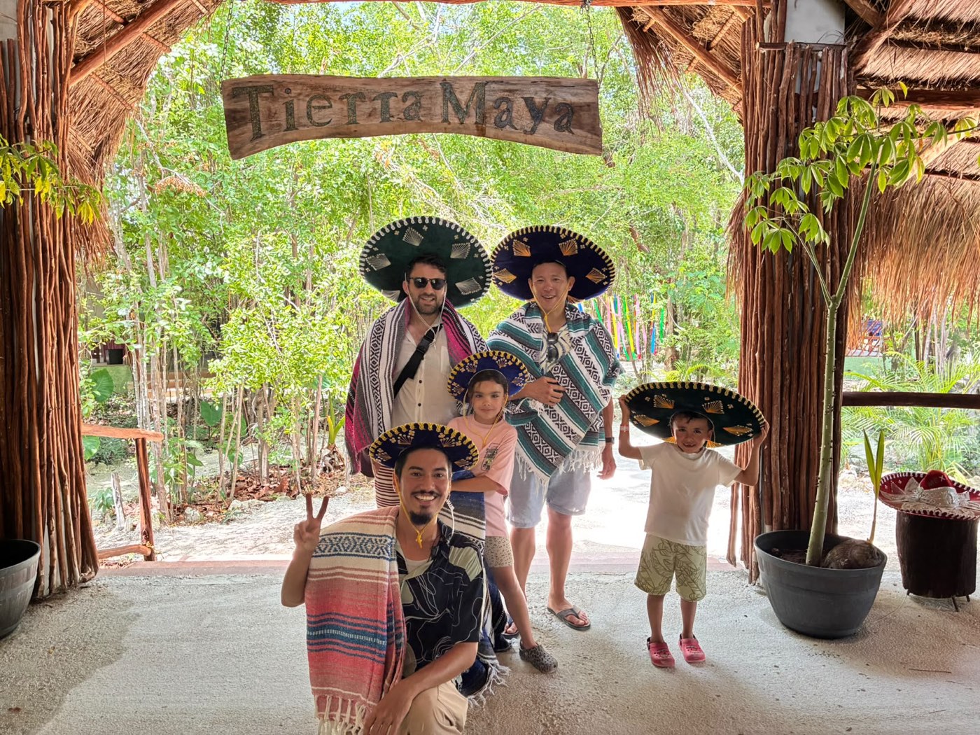 Guests in sombreros with their host