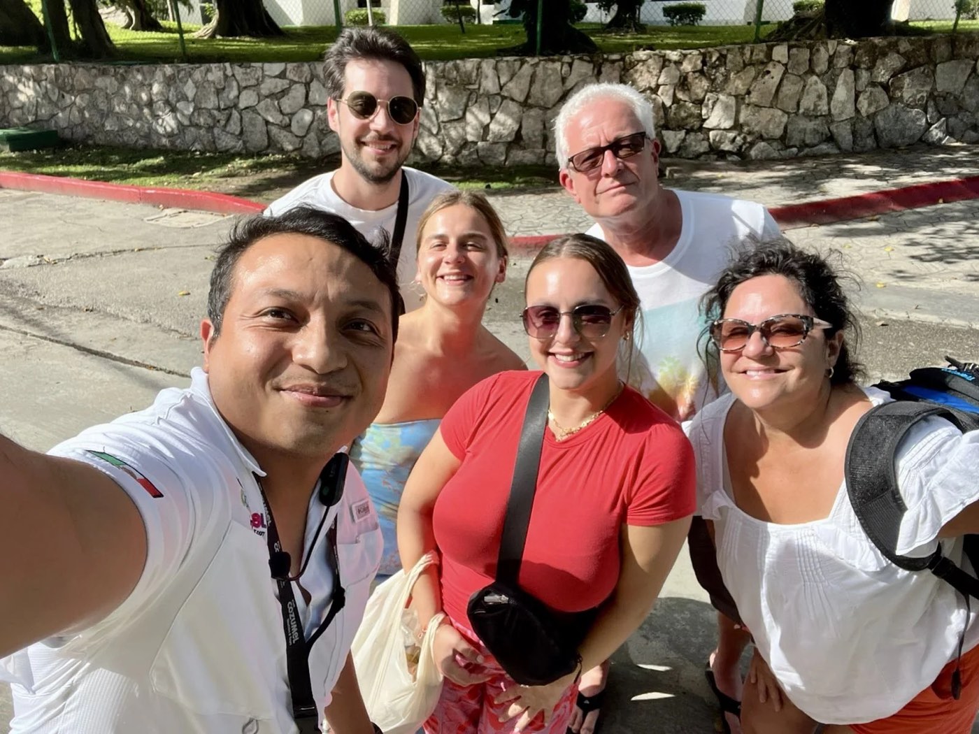 Guests and their guide on a Cozumel street